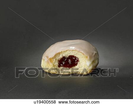Doughnut with sugar icing View Large Photo Image Stock Photo - Doughnut with sugar icing. Fotosearch