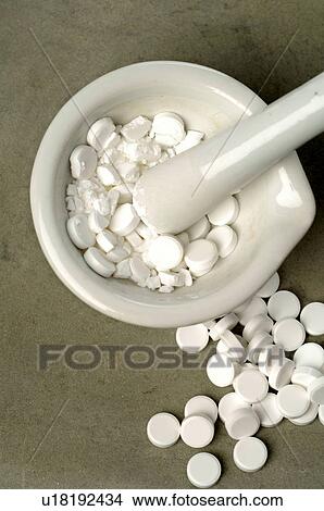 Dr. Schüssler's cell salts pills in a motar View Large Photo Image Picture - Dr. Schüssler's cell salts pills in a motar. Fotosearch