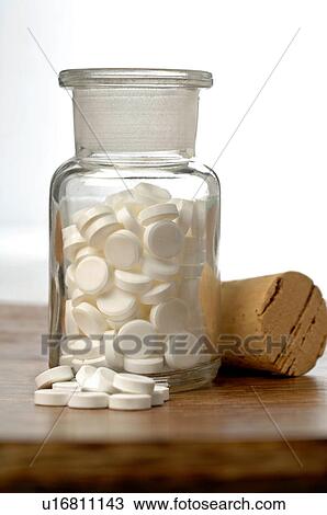 Stock Image - Dr. Schüssler's cell salts pills in a bottle. Fotosearch