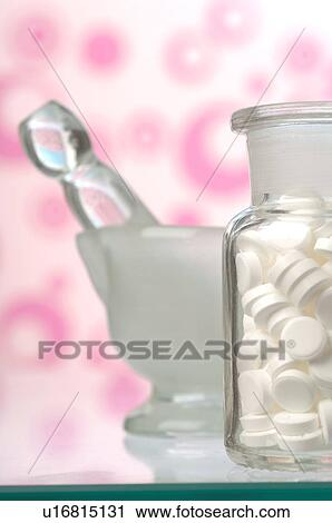Stock Image - Dr. Schüssler's cell salts pills in a bottle. Fotosearch