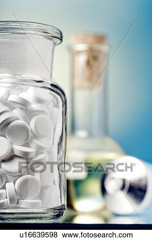 Stock Photo - Dr. Schüssler's cell salts pills in a bottle. Fotosearch