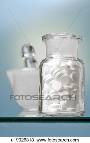 Stock Photo - Dr. Schüssler's cell salts pills in a bottle. Fotosearch