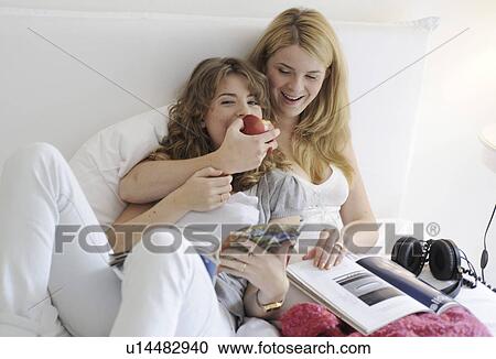 Stock Image - Eat my apple. Fotosearch