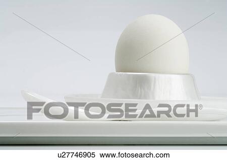Stock Photography - Egg cup with egg. Fotosearch