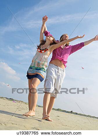 Stock Photography - Enjoying summer together. Fotosearch