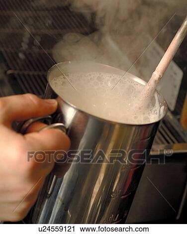 Stock Image - Espresso machine, milk steamer. Fotosearch