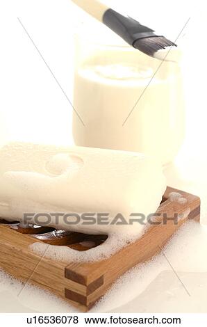 Facial mask with yoghurt, a brush and a soap bar View Large Photo Image Stock Photo - Facial mask with yoghurt, a brush and a soap bar. Fotosearch