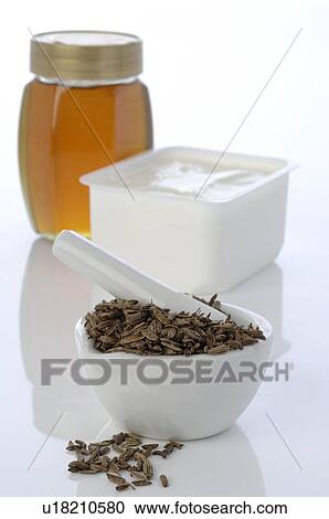 Stock Image - Fennel tea masks. Fotosearch
