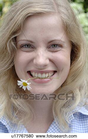 Flower in mouth View Large Photo Image Stock Image - Flower in mouth. Fotosearch
