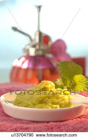 Stock Image - Foot balm with lavender, sage and rosemary. Fotosearch