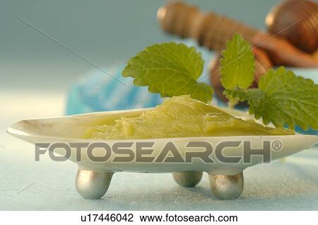 Stock Image - Foot balm with lavender, sage and rosemary. Fotosearch