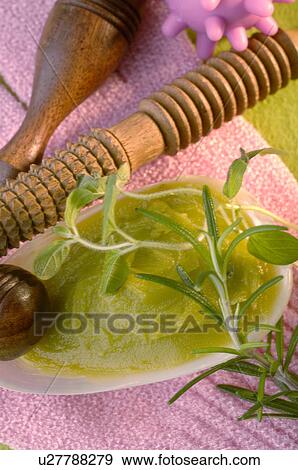 Stock Photo - Foot balm with lavender, sage and rosemary. Fotosearch