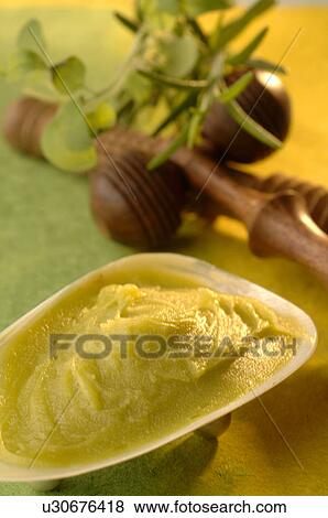 Stock Photo - Foot balm with lavender, sage and rosemary. Fotosearch