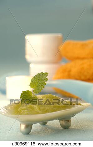 Stock Photograph - Foot balm with lavender, sage and rosemary. Fotosearch
