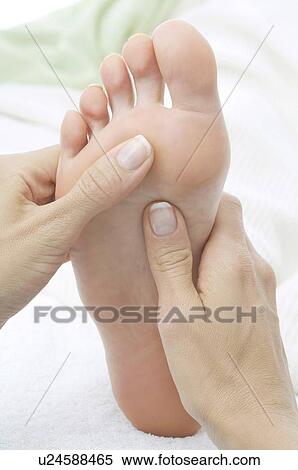 Stock Photography - Foot zone massage. Fotosearch