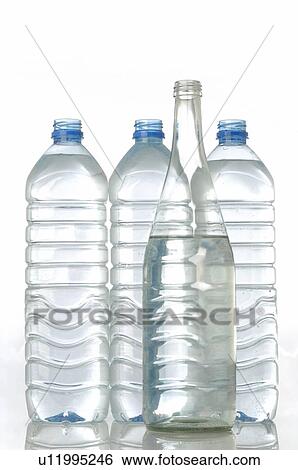 Four bottles of water View Large Photo Image Stock Photograph - Four bottles of water. Fotosearch