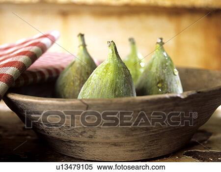 Fresh figs in a wooden bowl View Large Photo Image Stock Photography - Fresh figs in a wooden bowl. Fotosearch