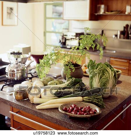 Stock Image - Fresh vegetables in kitchen. Fotosearch