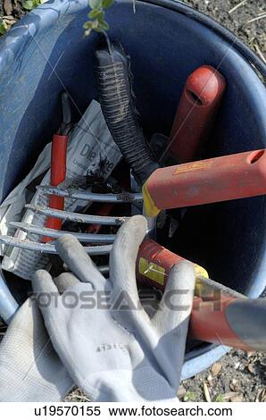 Gardening tools inside bucket View Large Photo Image Stock Photography - Gardening tools inside bucket. Fotosearch