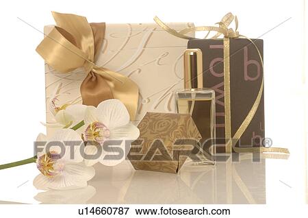 Gifts and small perfume bottle View Large Photo Image Stock Photo - Gifts and small perfume bottle. Fotosearch