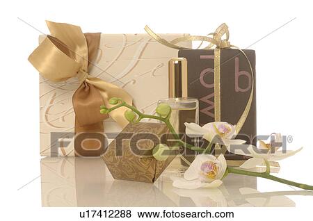 Gifts and small perfume bottle View Large Photo Image Stock Photo - Gifts and small perfume bottle. Fotosearch