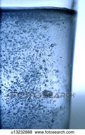 Glass of sparkling water View Large Photo Image Stock Photo - Glass of sparkling water. Fotosearch