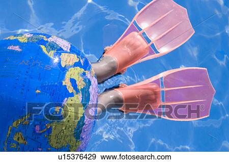 Stock Photo - Globe water ball and flippers. Fotosearch