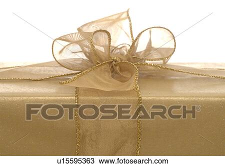 Gold gift View Large Photo Image Stock Image - Gold gift. Fotosearch