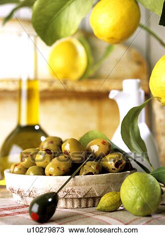 Green olives (Olea europaea) View Large Photo Image Stock Image - Green olives (Olea europaea). Fotosearch