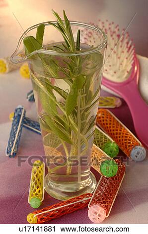 Stock Image - Hair conditioner with sage and rosemary. Fotosearch