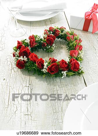 Heart made of roses, myrtle, baby´s breath View Large Photo Image Stock Photo - Heart made of roses, myrtle, baby´s breath. Fotosearch