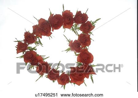 Stock Image - Heartshaped wreath of roses. Fotosearch