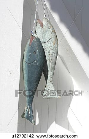 Stock Image - Holzfische. Fotosearch
