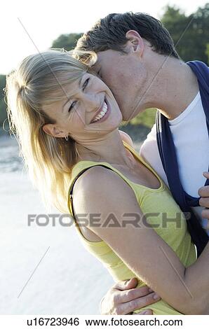 Stock Photograph - Kiss on the beach. Fotosearch