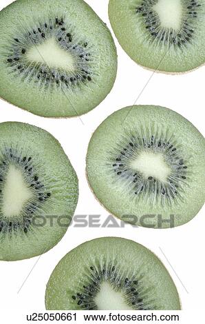 Stock Image - Kiwifruits halved. Fotosearch