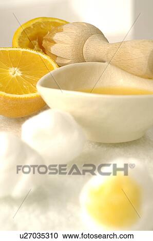 Stock Image - Kosmetik mit Orange. Fotosearch