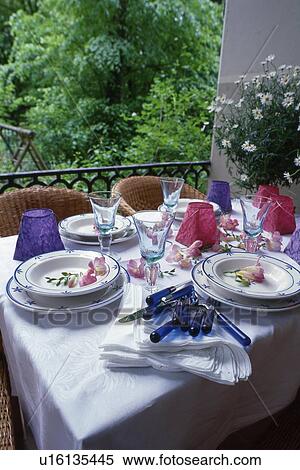 Laid table on balcony View Large Photo Image Stock Photography - Laid table on balcony. Fotosearch