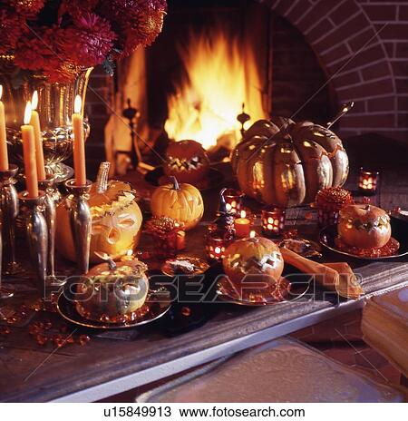 Laid table with pumpkins at the fireplace View Large Photo Image Stock Image - Laid table with pumpkins at the fireplace. Fotosearch