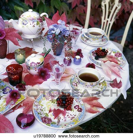 Laid tea table outdoors View Large Photo Image Stock Image - Laid tea table outdoors. Fotosearch