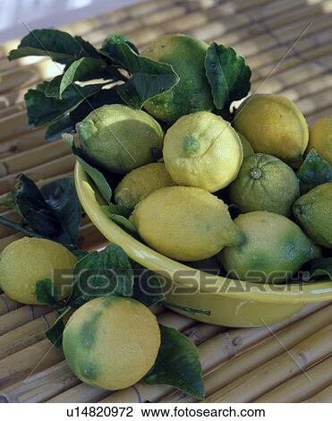 Stock Image - lemmon in a fruit bowl. Fotosearch