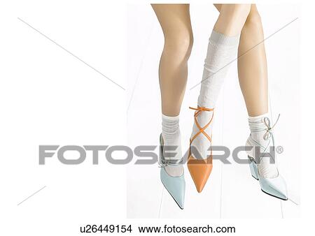 Light blue and orange shoes View Large Photo Image Picture - Light blue and orange shoes. Fotosearch