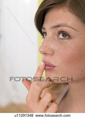 Stock Photo - Lip care. Fotosearch