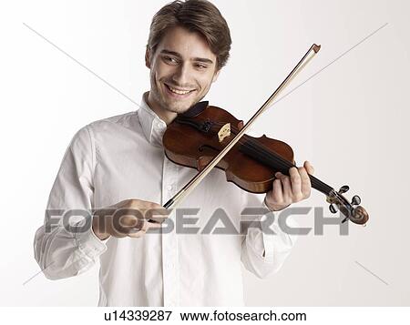Stock Photo - Man playing violin. Fotosearch