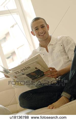 Stock Photo - Man reading papers. Fotosearch