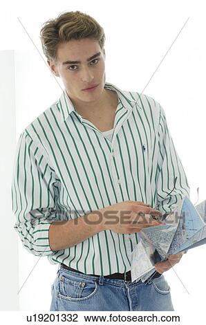 Stock Image - Man with city map. Fotosearch