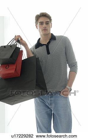 Stock Image - Man with paper bags. Fotosearch