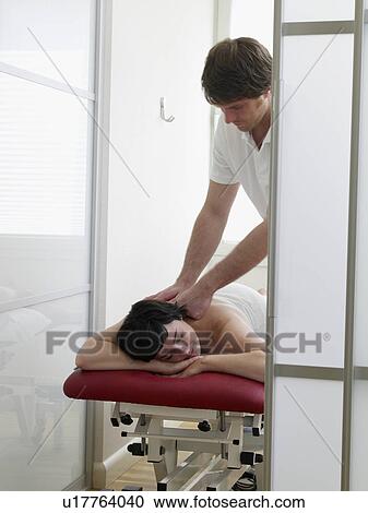 massage of the shoulder View Large Photo Image Stock Image - massage of the shoulder. Fotosearch