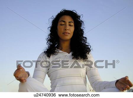 Stock Photograph - Meditation in the open. Fotosearch