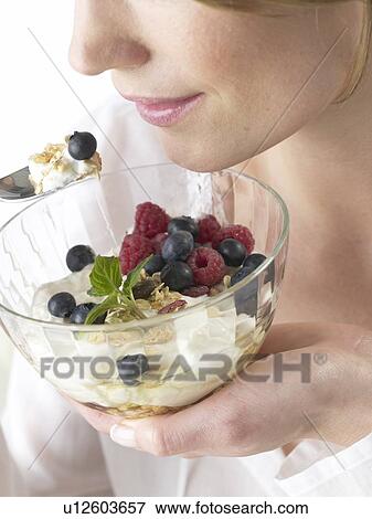 Muesli with berries and quark cheese View Large Photo Image Stock Photo - Muesli with berries and quark cheese. Fotosearch