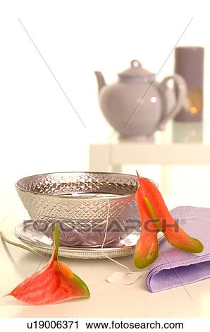 Pink roses and a silver teacup View Large Photo Image Stock Image - Pink roses and a silver teacup. Fotosearch